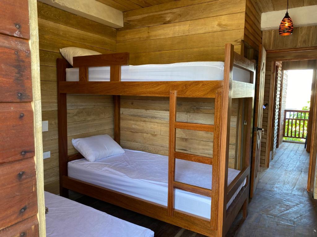 Postel nebo postele na pokoji v ubytování Petra Hotel