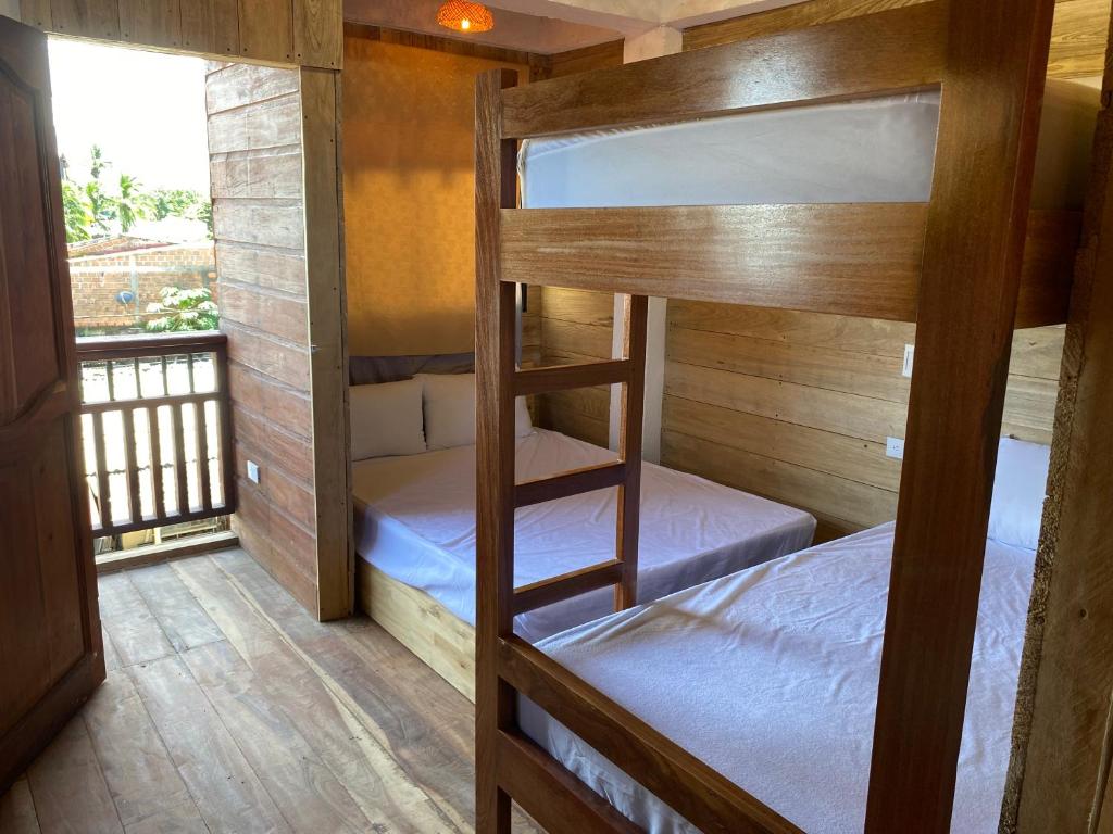 Postel nebo postele na pokoji v ubytování Petra Hotel