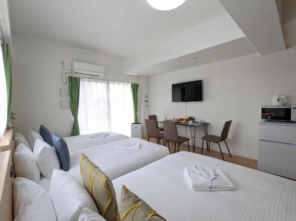 TV a/nebo společenská místnost v ubytování ESLEAD HOTEL Namba South Ⅰ