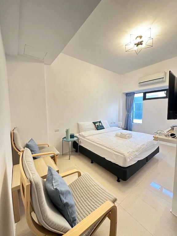 Postel nebo postele na pokoji v ubytování Elk Kitten Homestay