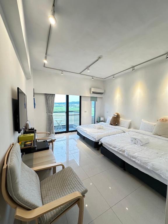 Postel nebo postele na pokoji v ubytování Elk Kitten Homestay