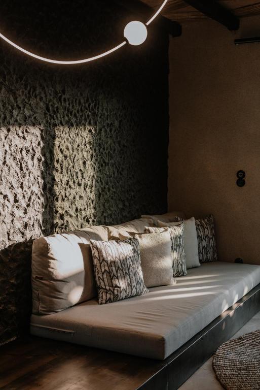 Postel nebo postele na pokoji v ubytování ONYM Curated Villas