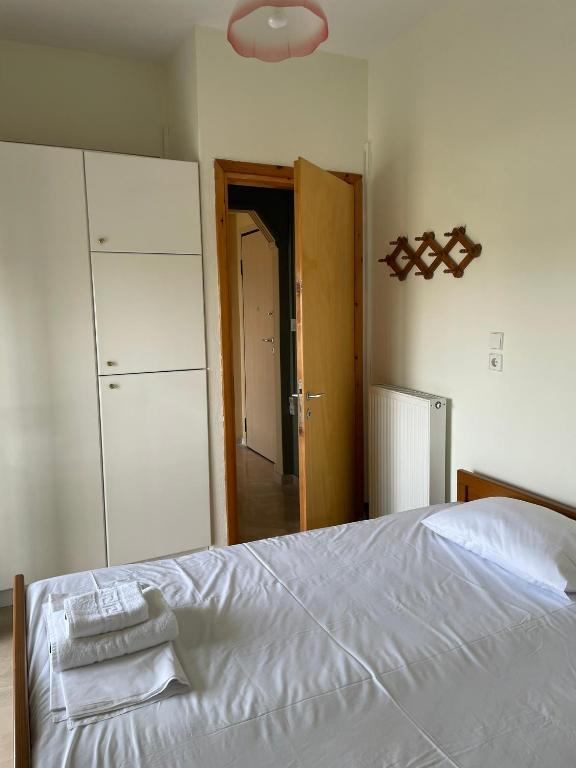 Postel nebo postele na pokoji v ubytování Apartment of Zeus/Leptokarya