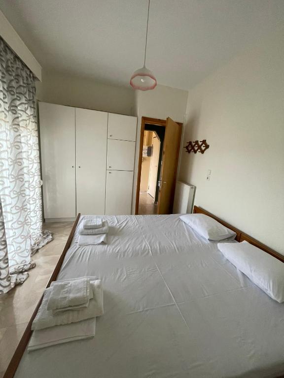 Postel nebo postele na pokoji v ubytování Apartment of Zeus/Leptokarya