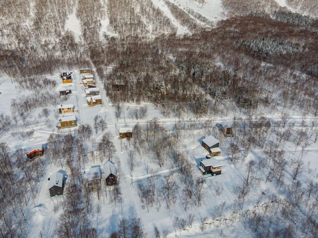 RuPow Lodge with air conditioner- walking distance to Rusutsu Resort v zimě