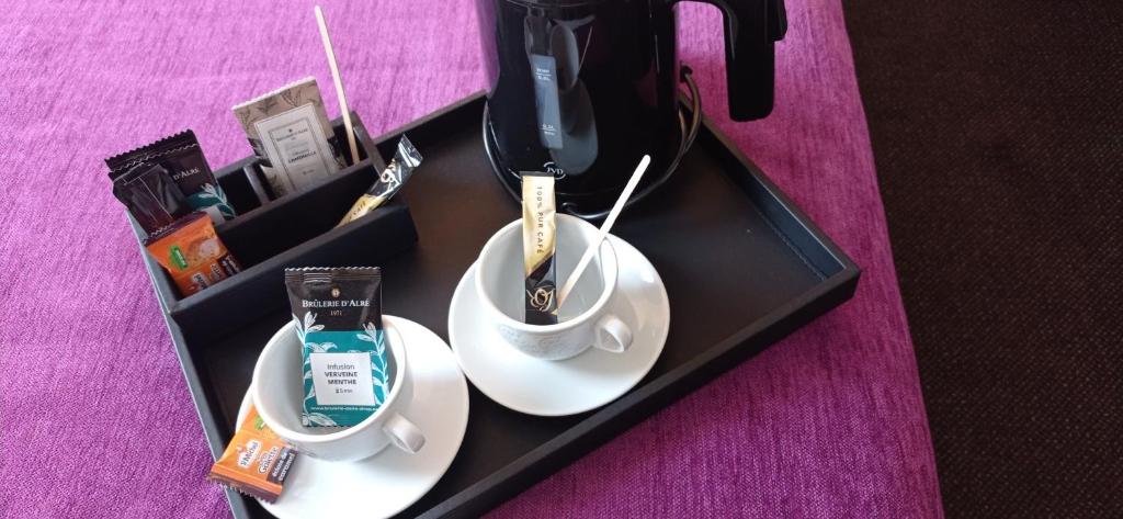 Nápoje v ubytování Brit Hotel Vannes-Theix