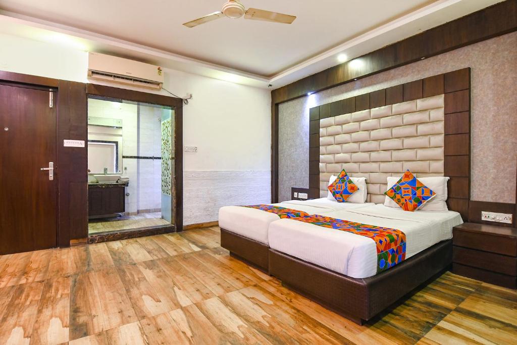 Postel nebo postele na pokoji v ubytování FabHotel Prime Goodwill