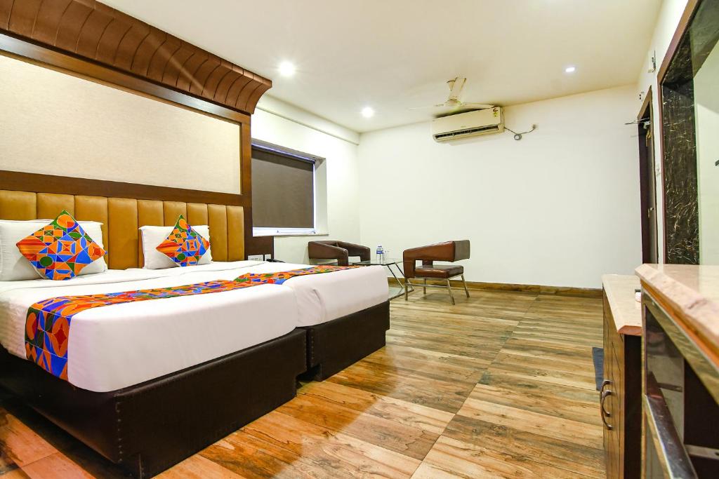 Postel nebo postele na pokoji v ubytování FabHotel Prime Goodwill