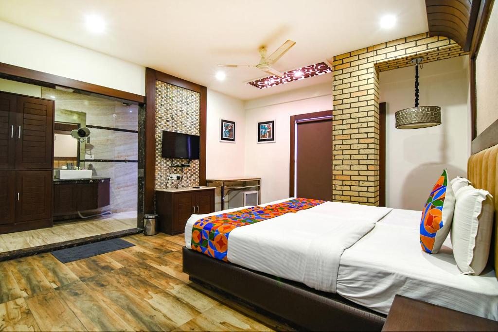 Postel nebo postele na pokoji v ubytování FabHotel Prime Goodwill