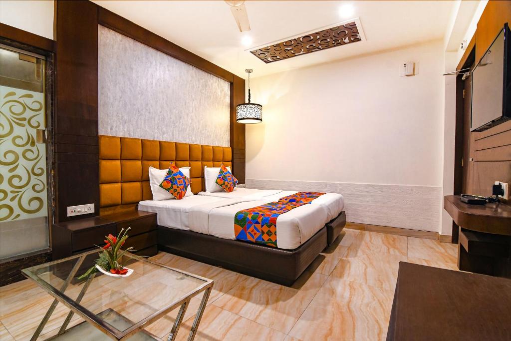 Postel nebo postele na pokoji v ubytování FabHotel Prime Goodwill