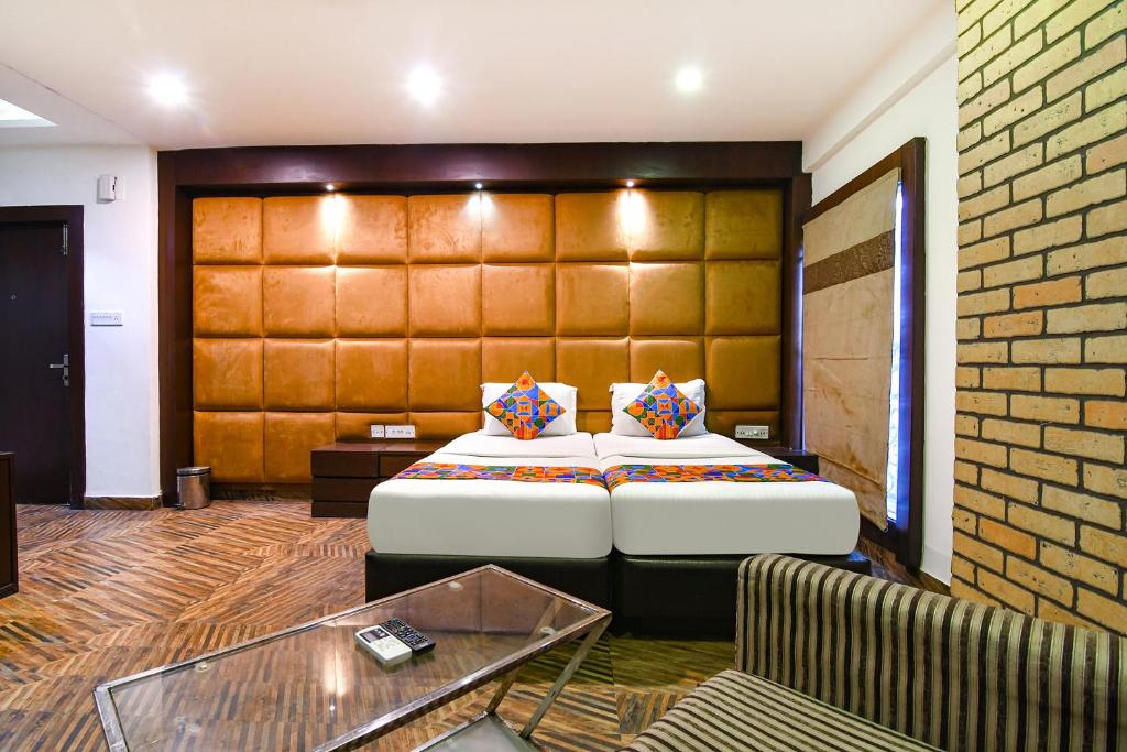 Postel nebo postele na pokoji v ubytování FabHotel Prime Goodwill