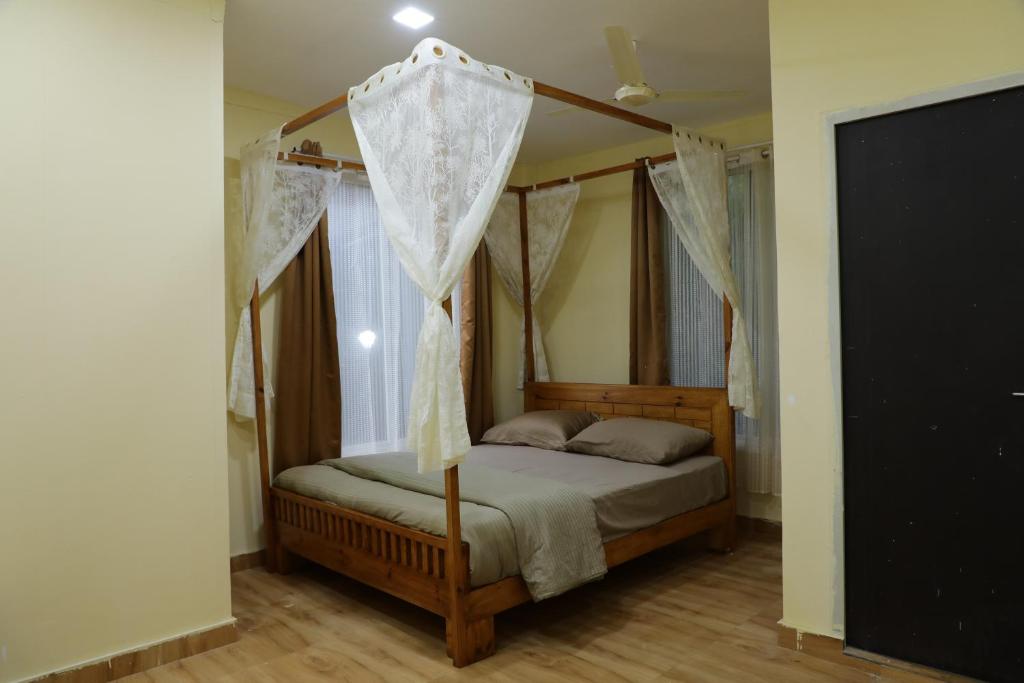 Postel nebo postele na pokoji v ubytování The Kille Torna Resort