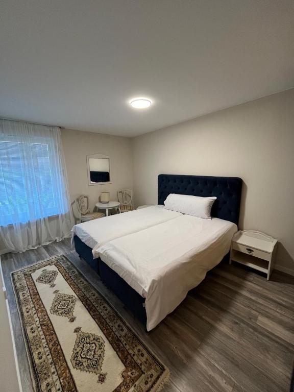 Postel nebo postele na pokoji v ubytování Köpingebro