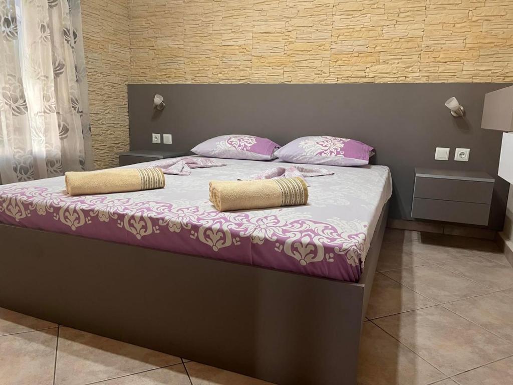 Ένα ή περισσότερα κρεβάτια σε δωμάτιο στο Villa Alexander 