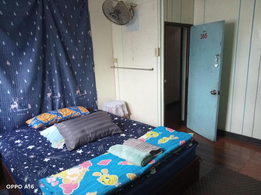 Postel nebo postele na pokoji v ubytování NP guesthouse