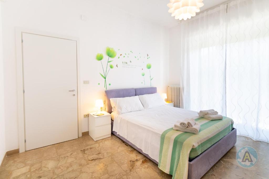 Ένα ή περισσότερα κρεβάτια σε δωμάτιο στο La casa del Sarto