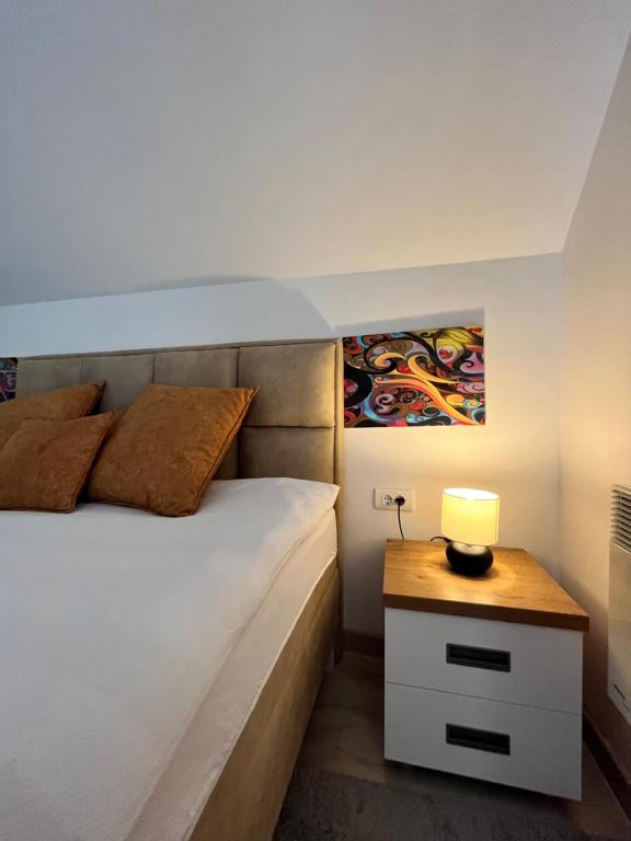 Postel nebo postele na pokoji v ubytování Apartman Pavle
