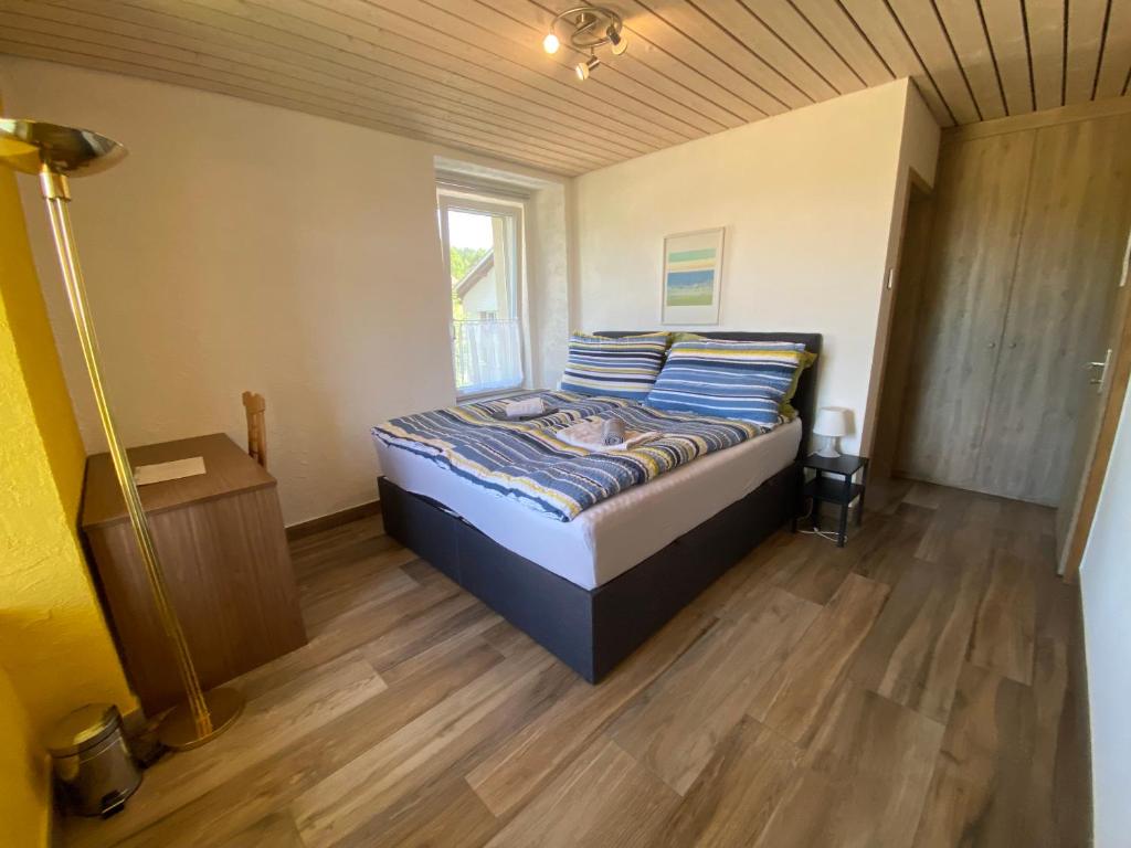 Postel nebo postele na pokoji v ubytování EssenceCiel