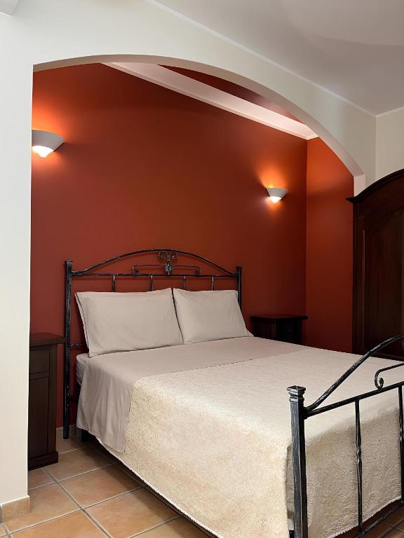 Postel nebo postele na pokoji v ubytování Le Residenze di Niso