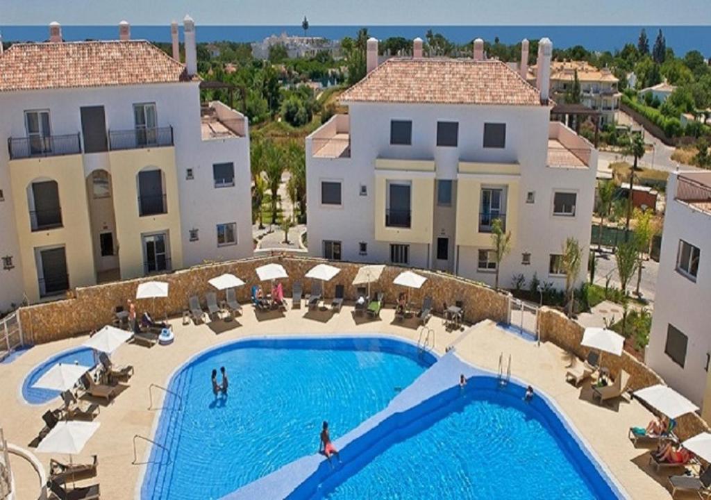Opomar 2 bed 3 bath Ground Floor Apartment with Communal Pool