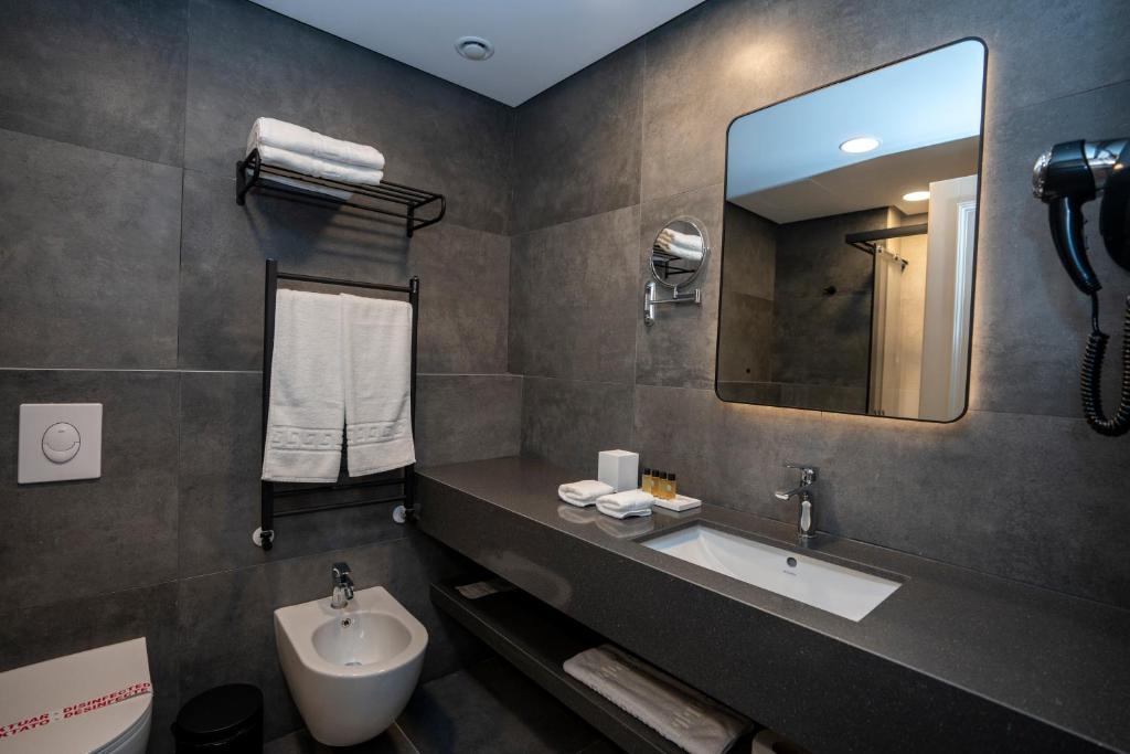 Koupelna v ubytování Hotel Mozart