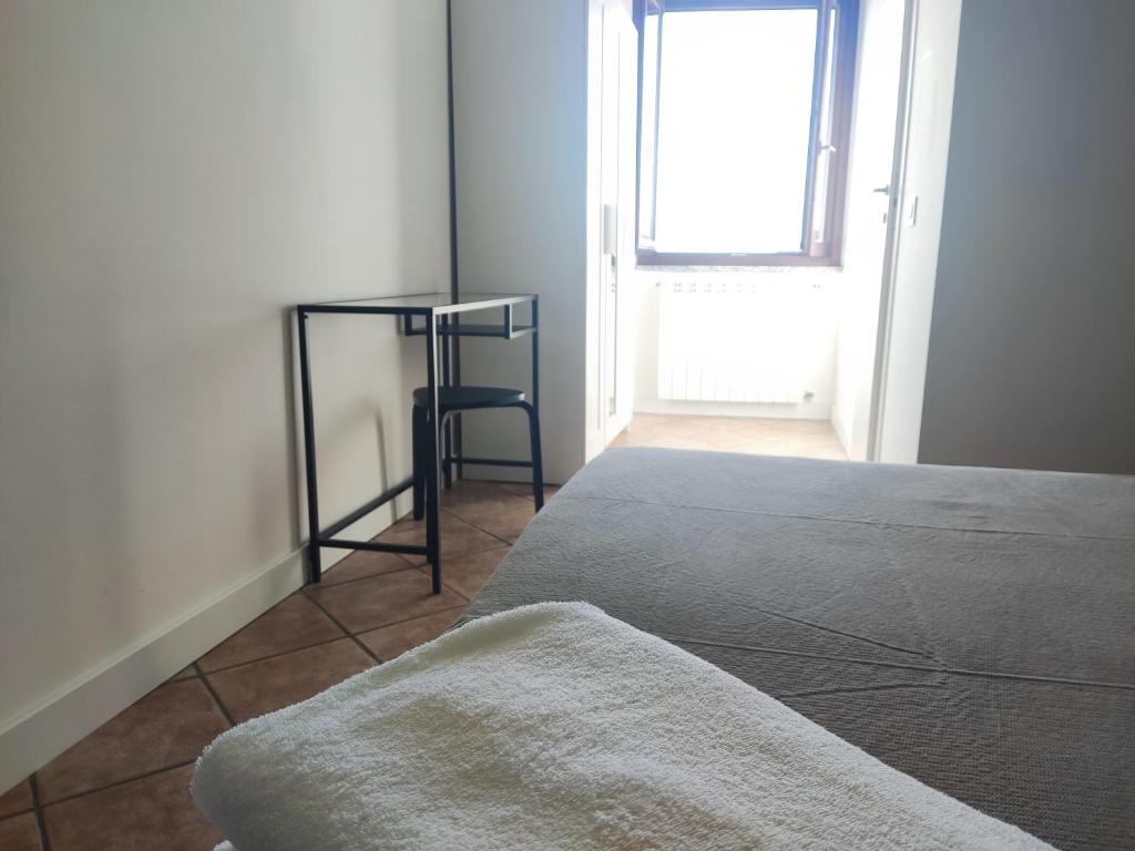 Postel nebo postele na pokoji v ubytování Ristorante Albergo Dante