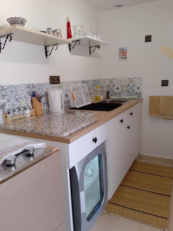 Kuchyň nebo kuchyňský kout v ubytování Tambarkiyt House Studio Appartement - Aourir Agadir