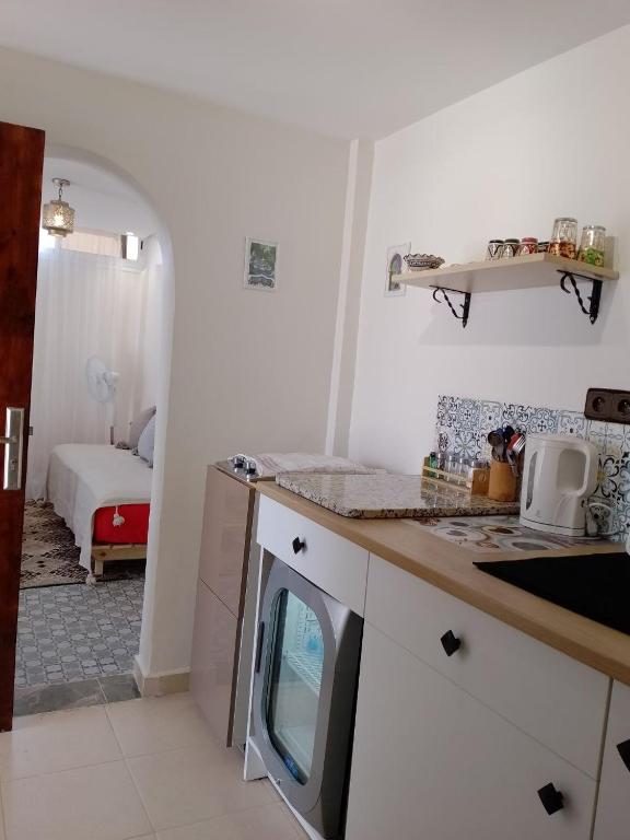 Kuchyň nebo kuchyňský kout v ubytování Tambarkiyt House Studio Appartement - Aourir Agadir