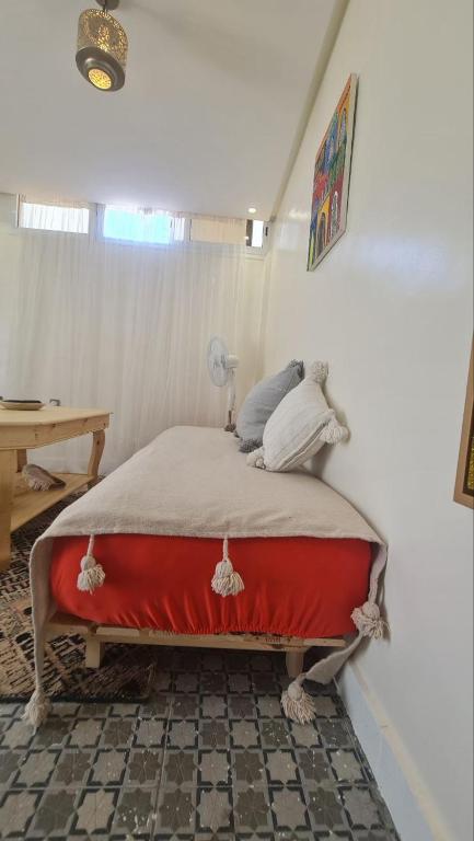 Postel nebo postele na pokoji v ubytování Tambarkiyt House Studio Appartement - Aourir Agadir