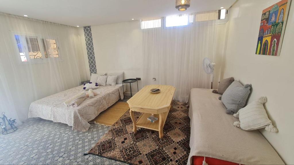 Postel nebo postele na pokoji v ubytování Tambarkiyt House Studio Appartement - Aourir Agadir