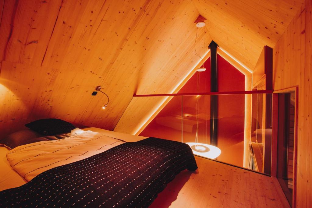 Postel nebo postele na pokoji v ubytování House Raduha