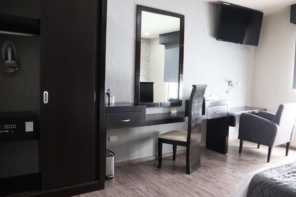 TV a/nebo společenská místnost v ubytování Wyndham Garden Aguascalientes Hotel & Casino