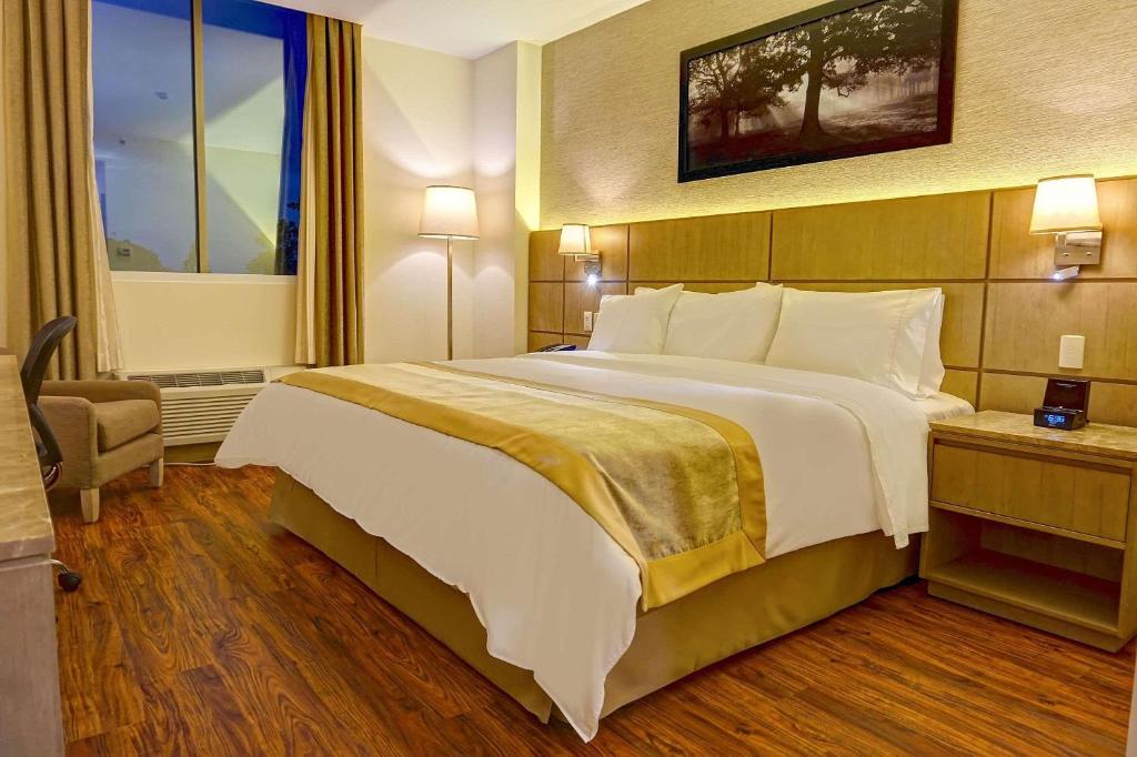 Postel nebo postele na pokoji v ubytování Radisson Hotel Guayaquil