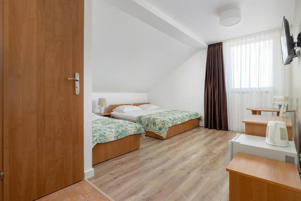Postel nebo postele na pokoji v ubytování Paula