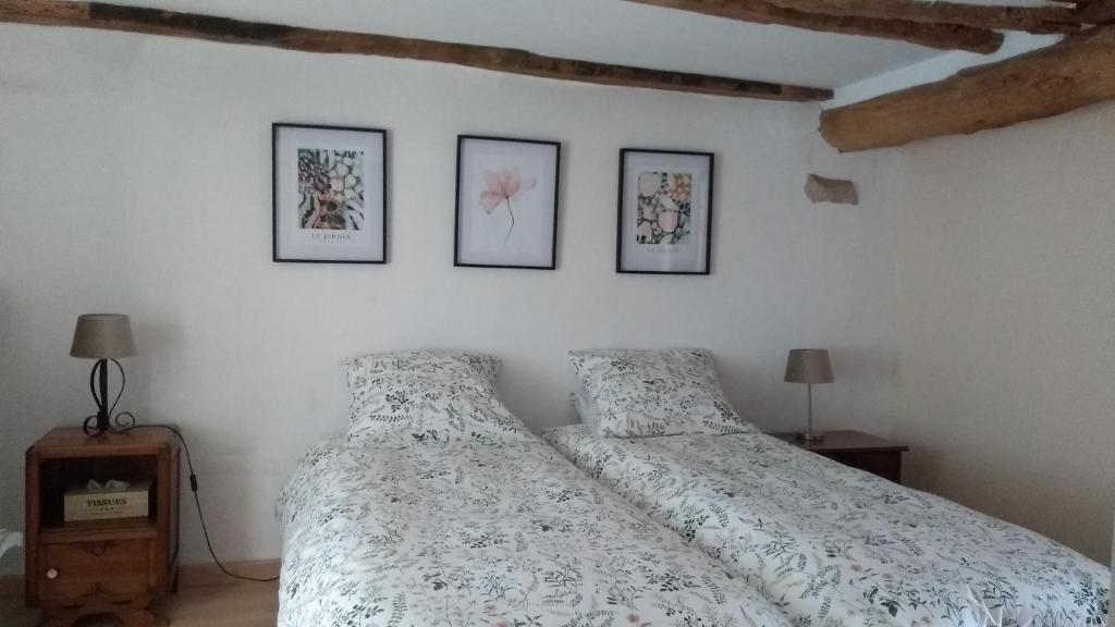 Postel nebo postele na pokoji v ubytování Domaine de Cadenne