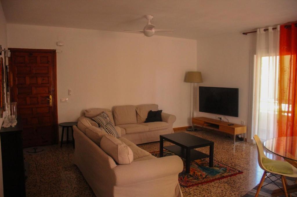 TV a/nebo společenská místnost v ubytování Apartamento Mallorca Piso de arriba