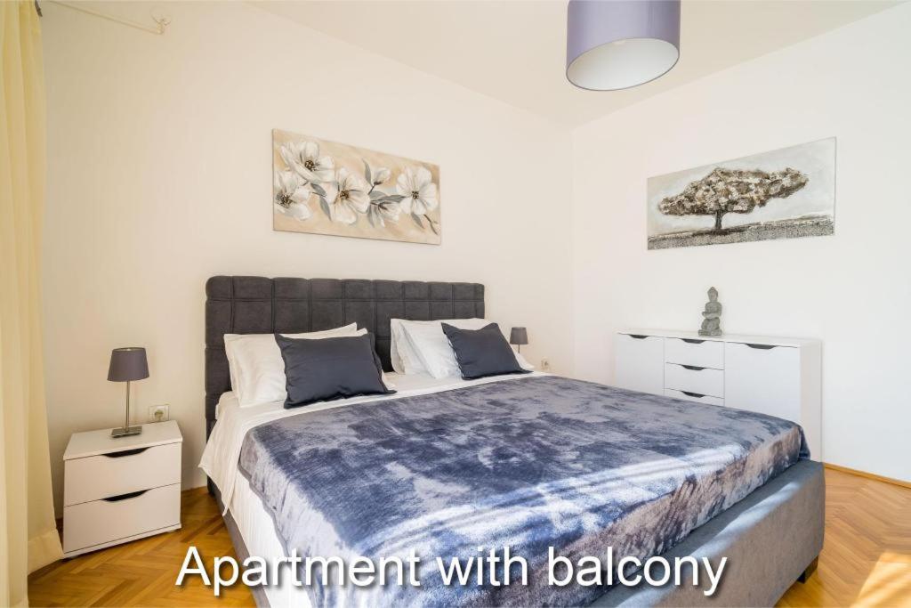 Posteľ alebo postele v izbe v ubytovaní Apartments Budman