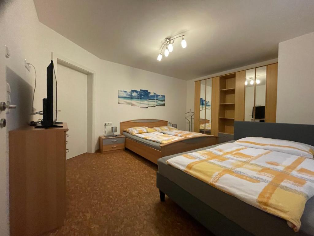 Postel nebo postele na pokoji v ubytování Karo`s Apartment