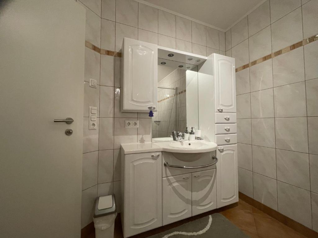 Koupelna v ubytování Karo`s Apartment