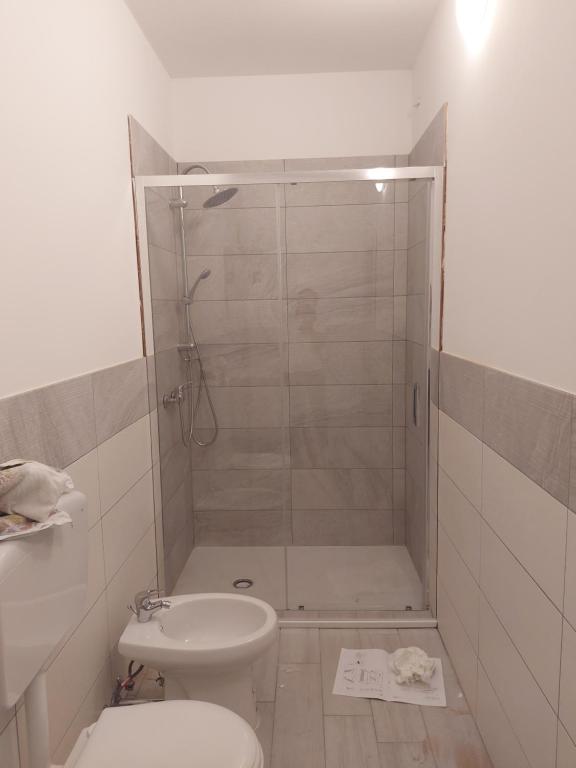 Koupelna v ubytování A casa di Adua