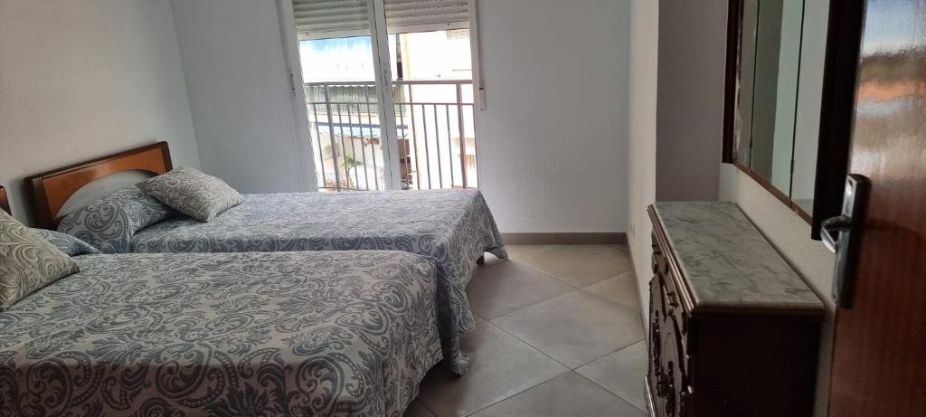 Postel nebo postele na pokoji v ubytování Habitación Doble a 100 m de la Playa