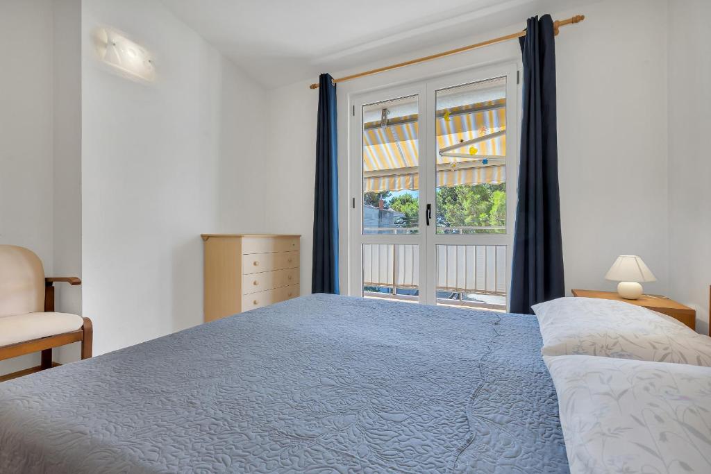 Posteľ alebo postele v izbe v ubytovaní Apartman KLARA 2