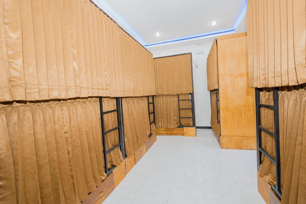 Postel nebo postele na pokoji v ubytování Kamkan Hostel