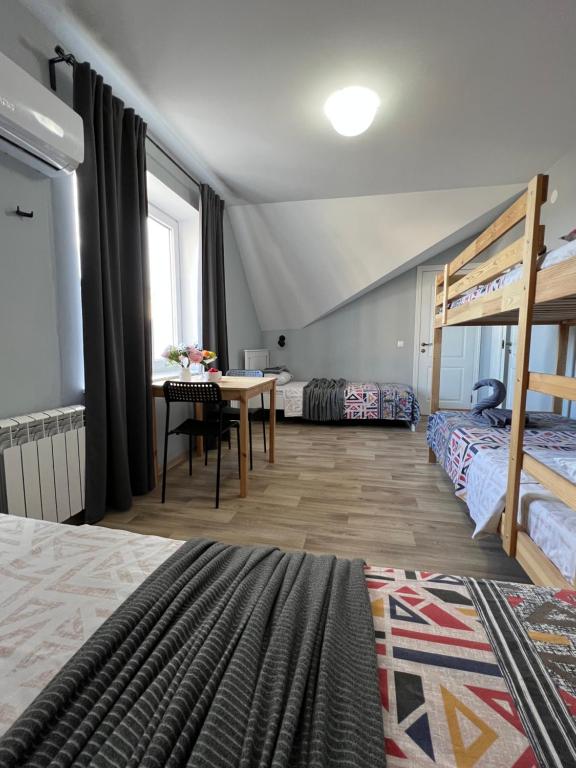 Гостевой Отель-125 - Lit Dans Une Salle De Dortoir Masculin à 4 Lits