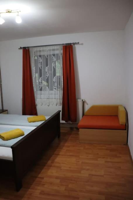 Postel nebo postele na pokoji v ubytování Cabană în inima munților - Gálkuti Kulcsosház