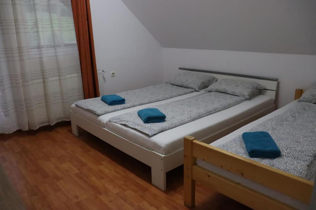 Postel nebo postele na pokoji v ubytování Cabană în inima munților - Gálkuti Kulcsosház