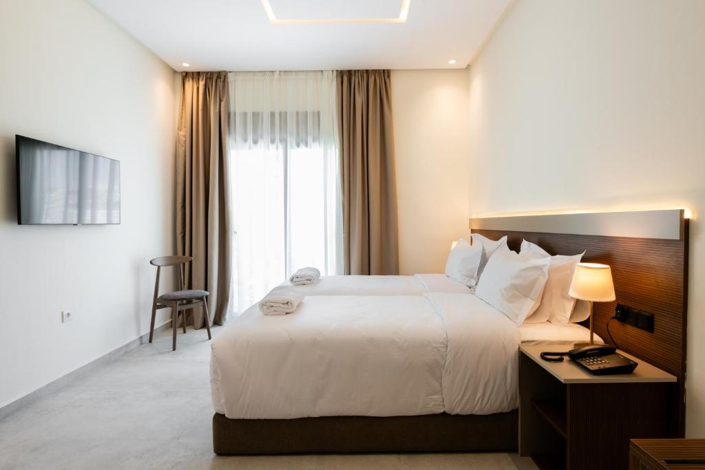 Voodi või voodid majutusasutuse Hotel El Toro Tanger toas