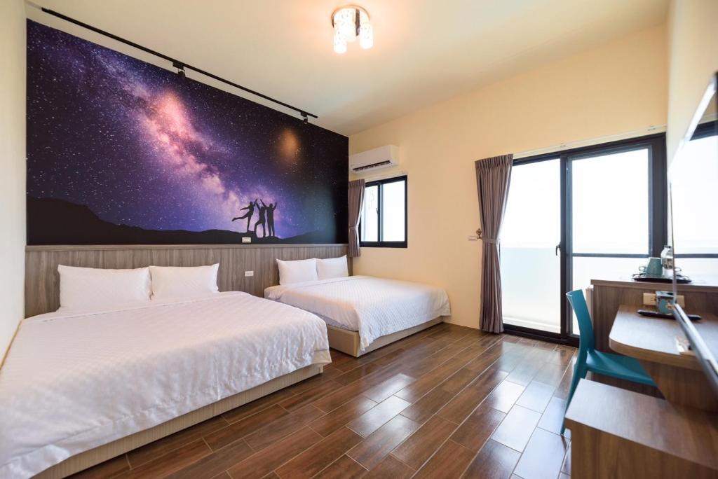 Postel nebo postele na pokoji v ubytování Across the Ocean B&B