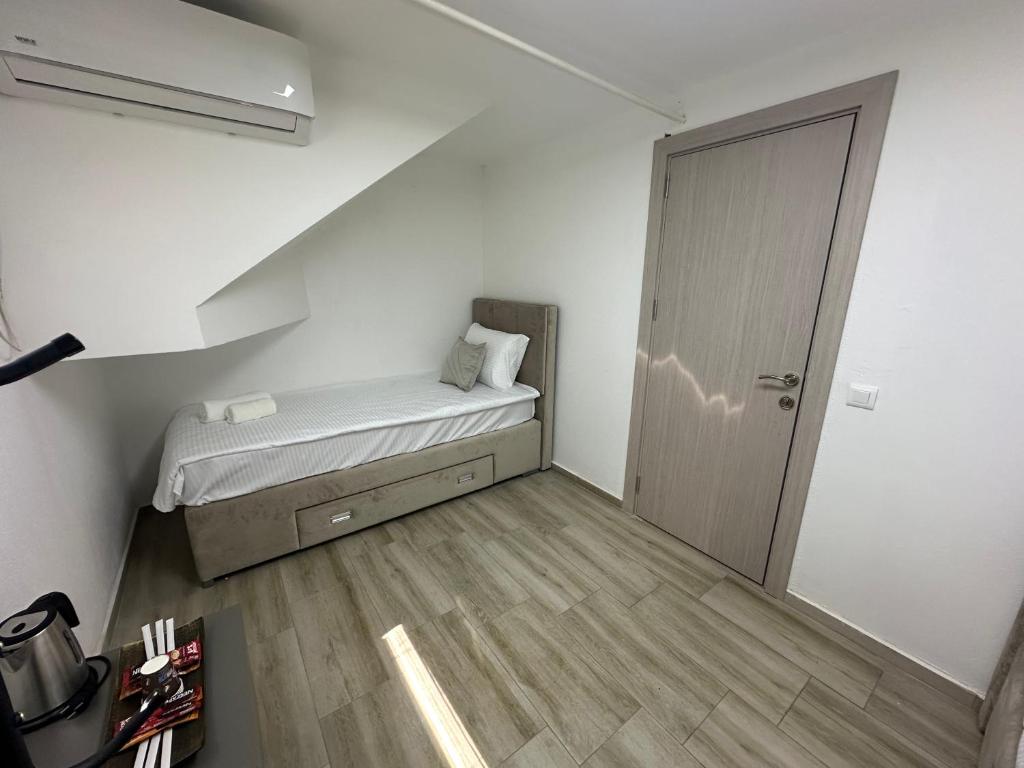 Postel nebo postele na pokoji v ubytování Next Rooms