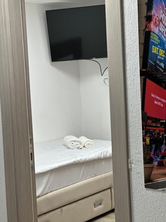 TV a/nebo společenská místnost v ubytování Next Rooms